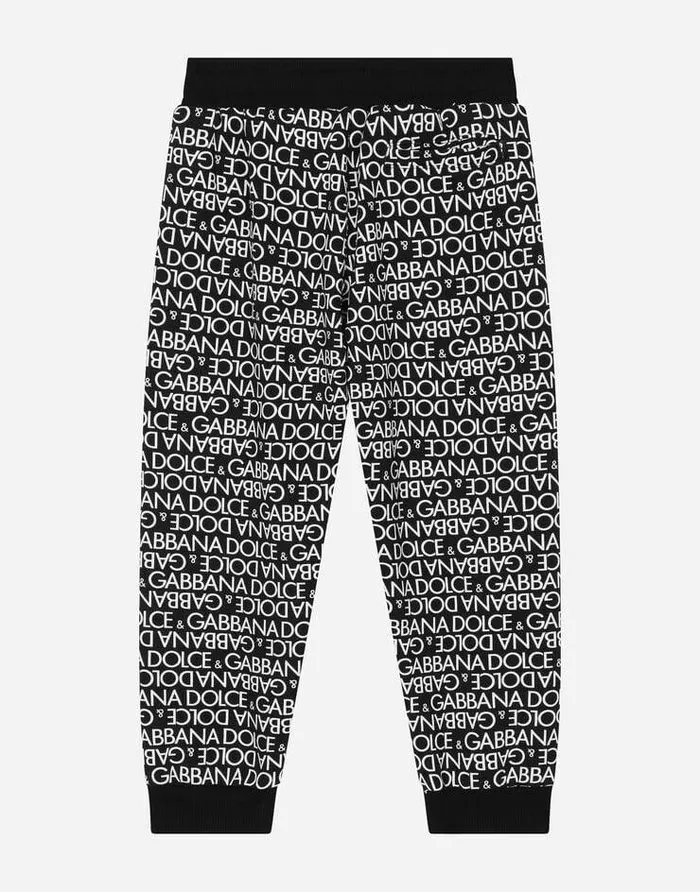 Dolce and Gabbana Trousers And Shorts Children Cotton Jogging Pants With The Allover Logo Print Multicolor